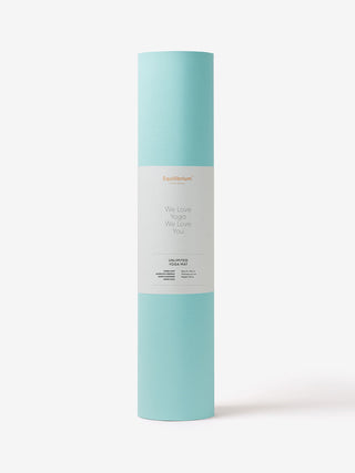 UNLIMITED yogamat groen opgerold met een label eromheen 